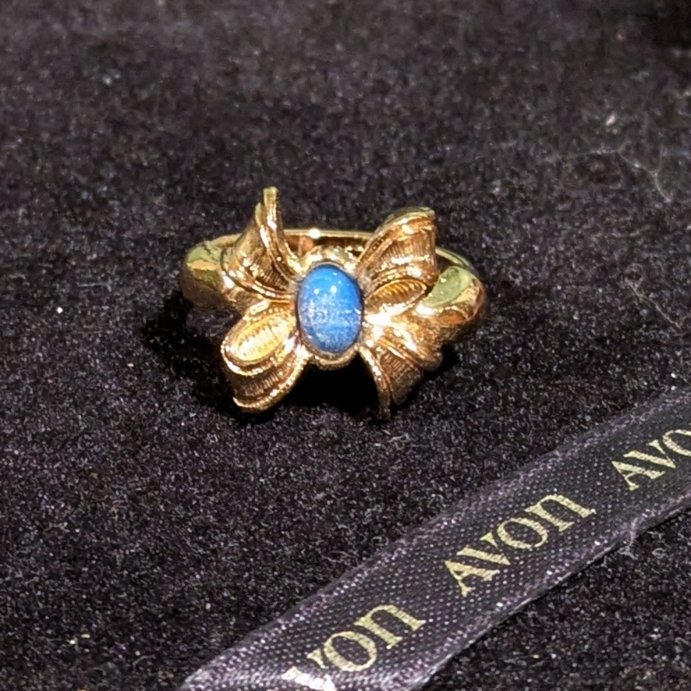 Vintage Avon Gold Tone Bow Ring with Faux Blue Opal Stone Size 7 3/4